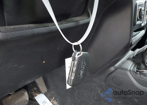 2021 Jeep Wrangler Unlimited Sport S 4X4 z USA, uszkodzony, nr VIN 1C4HJXDG9MW853726